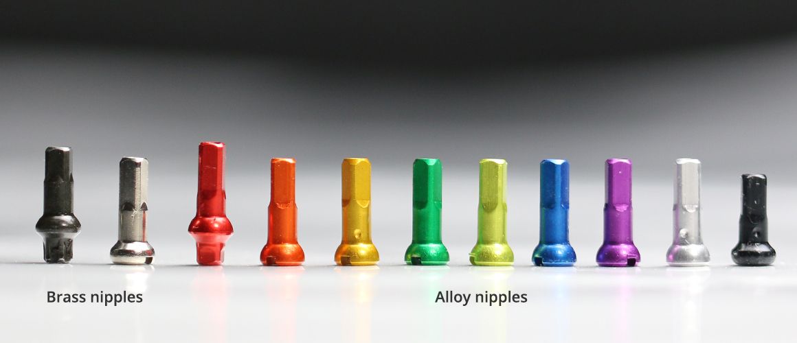 Sapim-Polyax-alloy-nipples-vs-sapim-polyax-secure-lock-brass-black-nipple-dt-swiss-squorx-pro-head-brass-silver-nipple.jpeg