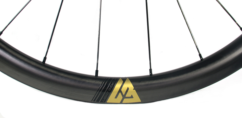 golden decal on light bicycle premium wheels