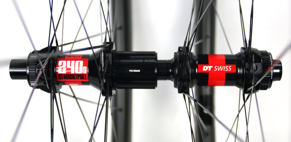 DT Swiss 240 laced with wide carbon rims