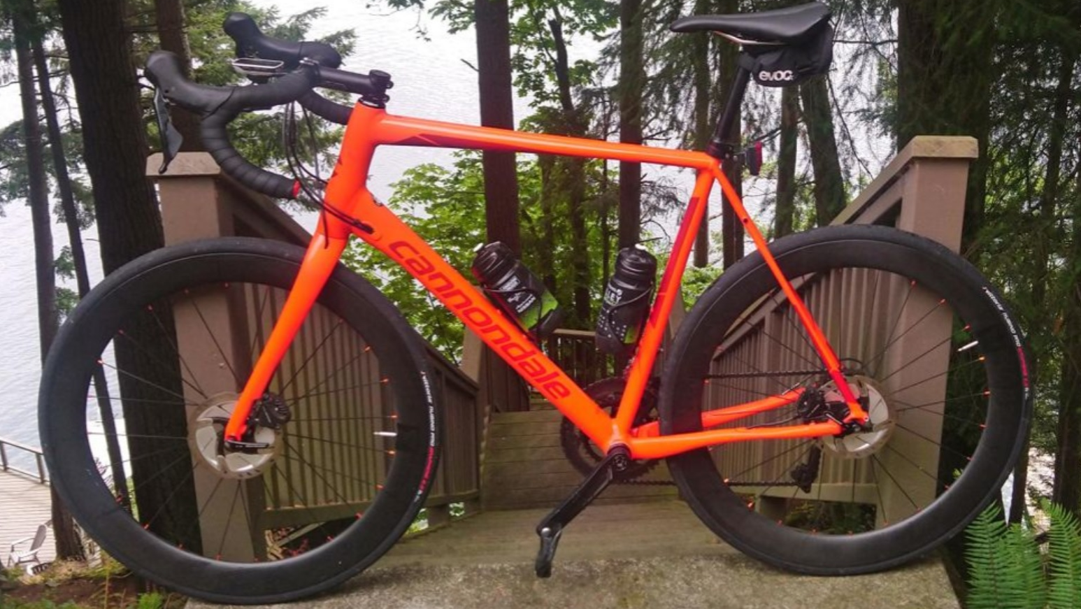 Cannondale-anodized-orange-road-disc-frame-with-56mm-carbon-wheels