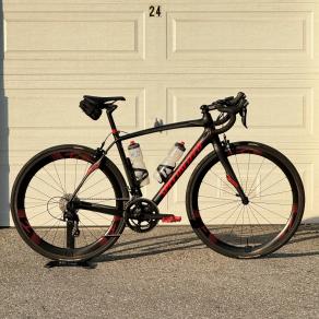 specialized-roubaix-sl4-rim-brake-on-light-bicycle-carbon-wheels